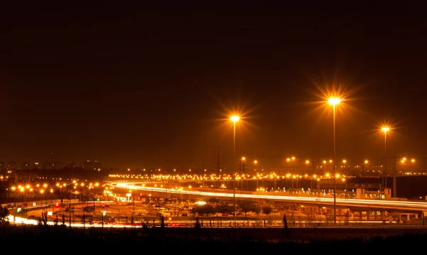 stock image Traffic car light stream at night