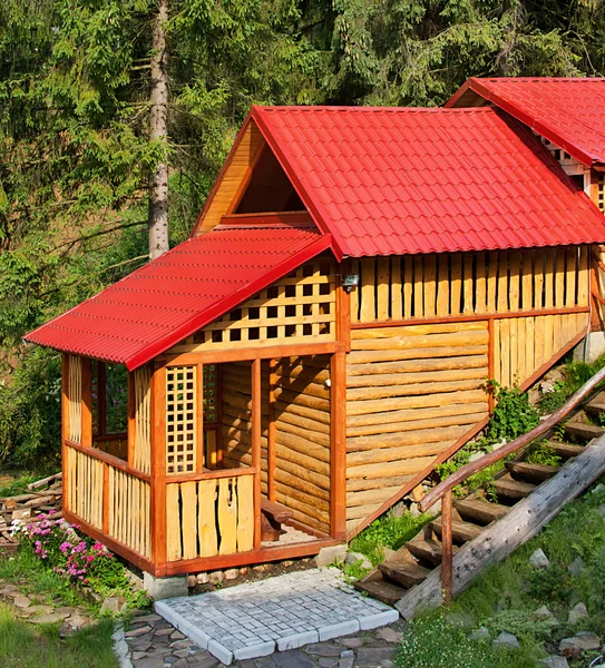 Building of the wooden house in wood — Stock Photo, Image