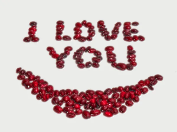 Valentin üdvözlőkártya, piros betűs felirattal: szeretlek — Stock Fotó