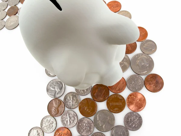 Piggy Bank on a trail of coins — Stock Photo, Image