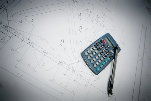 Project with pen and calculator — Stock Photo, Image
