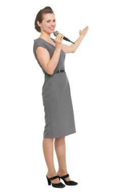 Woman reporter with microphone showing on copy space isolated clipart