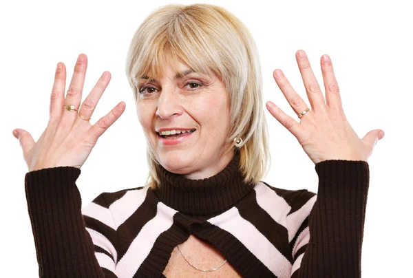Senior woman showing hands — Stock Photo, Image