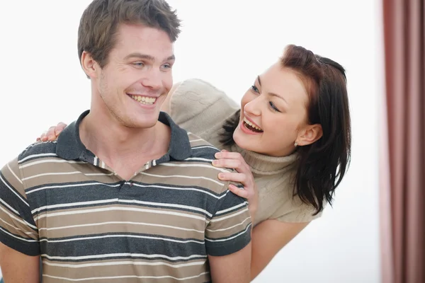 Portrait of smiling young couple having fun — Stock Photo, Image
