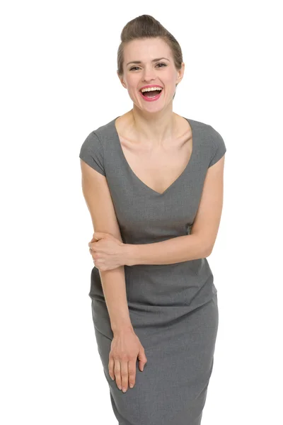 Lachende gelukkig vrouw in jurk geïsoleerd — Stockfoto