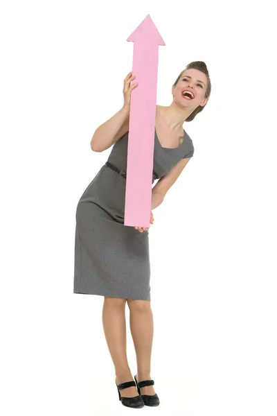 Glückliche Geschäftsfrau mit dickem Pfeil, der isoliert nach oben zeigt — Stockfoto