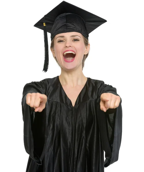 Estudante de graduação mulher apontando em você isolado — Fotografia de Stock