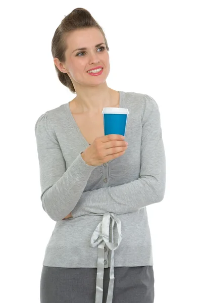 Smiling business woman with cup of coffee looking on copy space — Stock Photo, Image