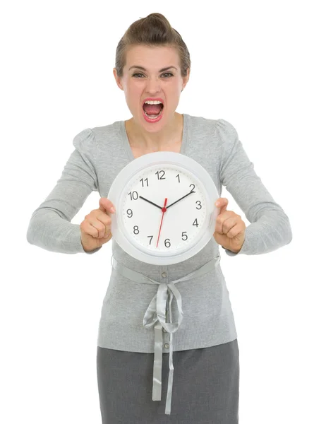 Stressed business woman showing clock — Stock Photo, Image
