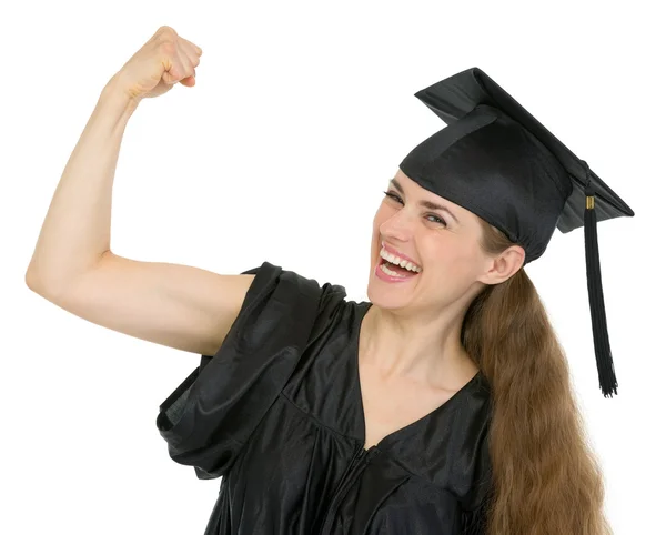 Examen studerande kvinna visar biceps — Stockfoto