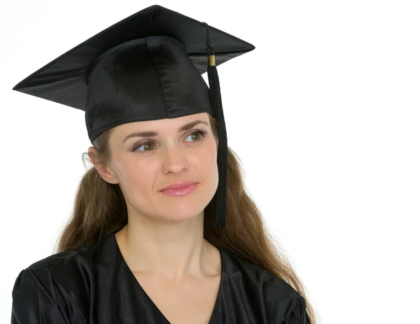 Portrait of thoughtful graduation woman looking on copy space — Stock Photo, Image