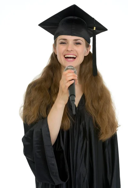 Gelukkig afstuderen student vrouw spreken microfoon — Stockfoto