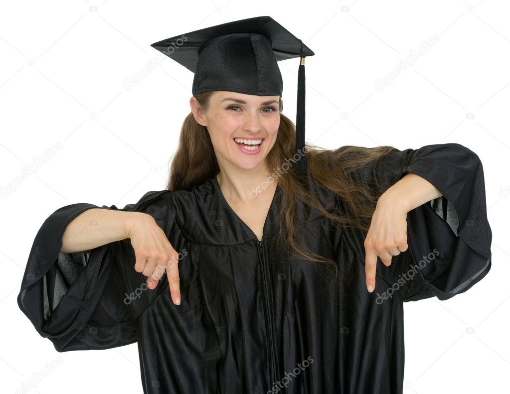 Happy graduation student woman pointing down