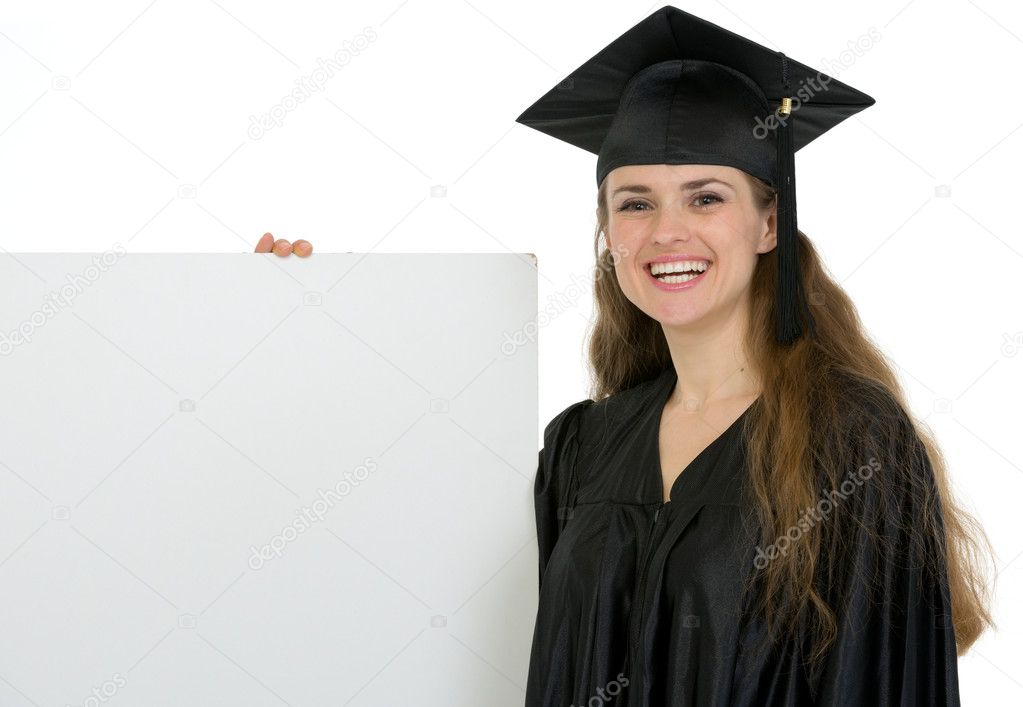 Happy graduation female student holding blank billboard