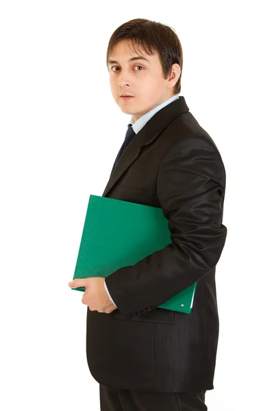 Serious modern businessman holding folder in hand — Stock Photo, Image