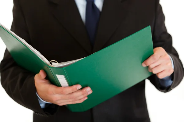 Businessman holding folder with documents in hand. Close-up. — Stock Photo, Image