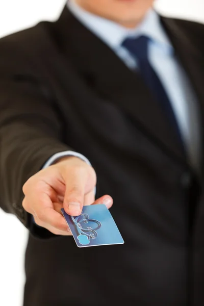 Businessman giving credit card. Close-up. — Stock Photo, Image