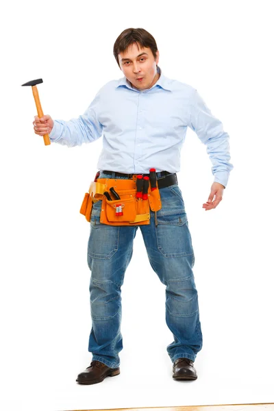 Construction worker showing monkey with hammer. Unskillful tool — Stock Photo, Image
