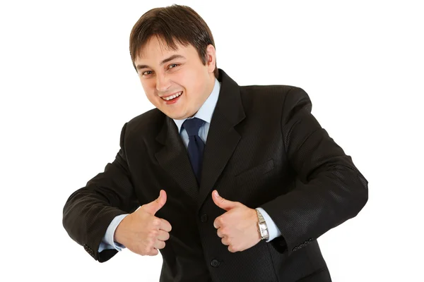 Glimlachend jonge zakenman tonen duimschroef opwaarts gebaar — Stockfoto