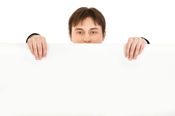Man holding blank billboard — Stock Photo, Image