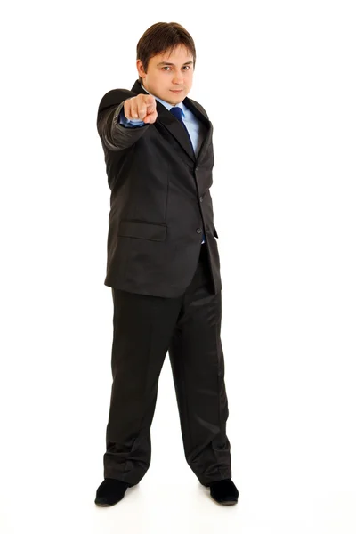 Full length portrait of smiling businessman pointing finger at you — Stock Photo, Image