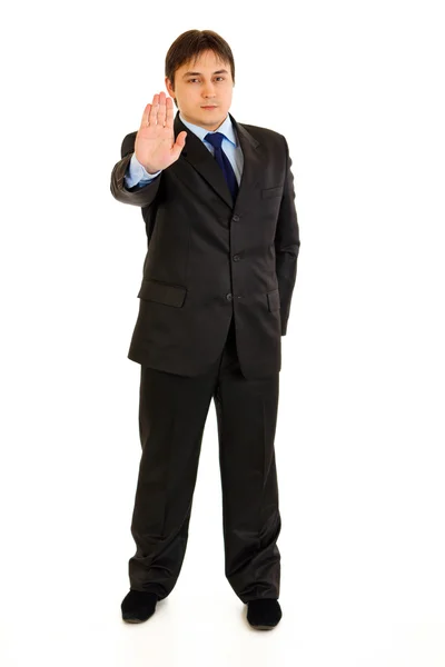 Ganzkörperporträt eines selbstbewussten modernen Geschäftsmannes mit Stop-Geste — Stockfoto