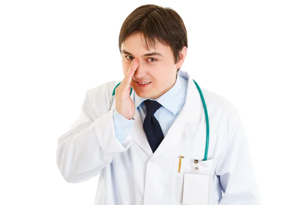 Friendly medical doctor secretly reporting good news — Stock Photo, Image