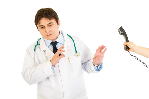 Very busy medical doctor refusing answer on phone call — Stock Photo, Image