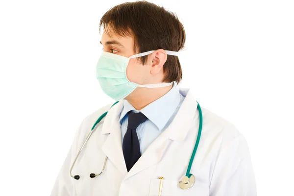 Medical doctor in mask looking at copy space — Stock Photo, Image