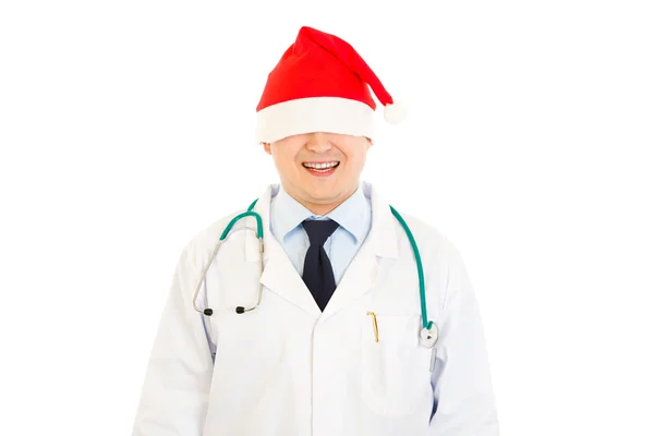 Smiling medical doctor in Christmas hat stretched over his eyes — Stock Photo, Image