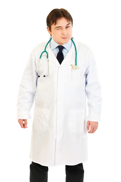 Młody lekarz conspiratorially mrugania — Zdjęcie stockowe