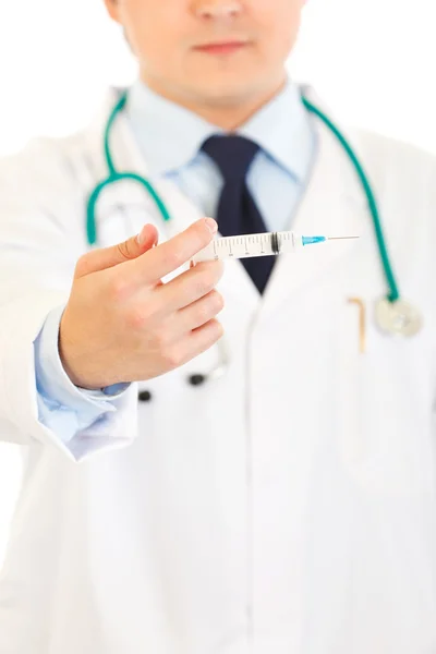 Doctor with medical syringe in hands. Close-up. — Stock Photo, Image