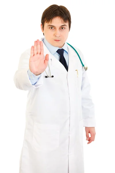Auktoritära läkare visar stopp gest Stockbild
