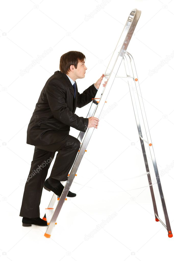 Modern businessman climbing upwards up on ladder