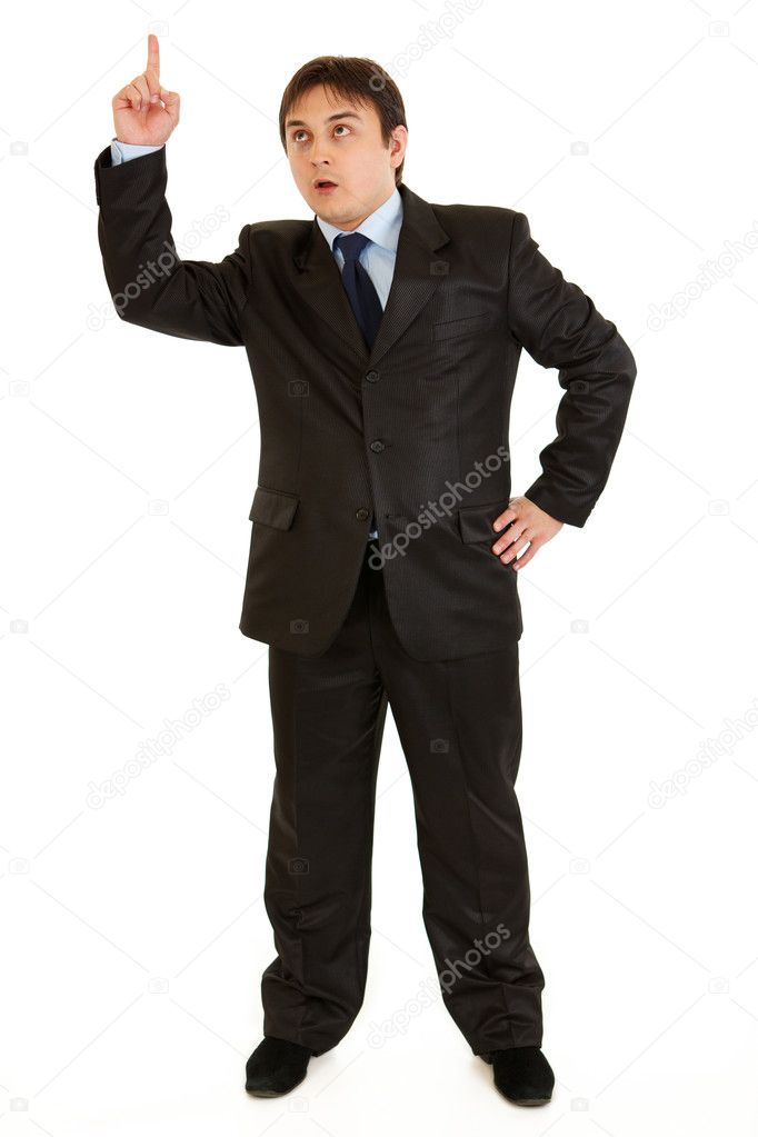 Modern businessman with rised finger. Idea gesture