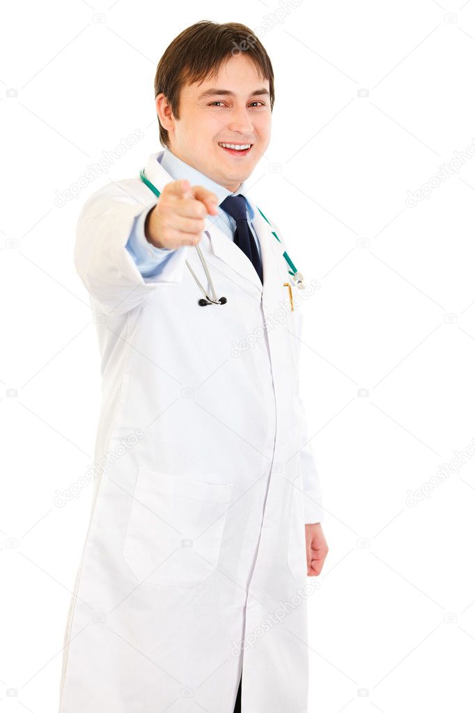 Smiling young medical doctor pointing finger at you