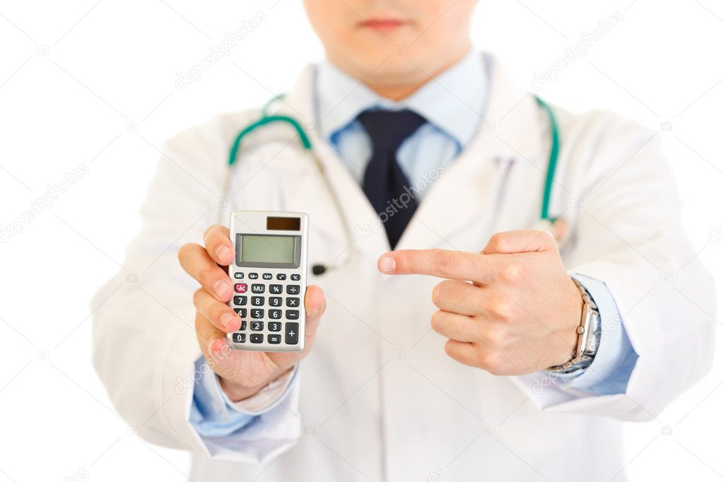 Medical doctor pointing finger on calculator. Close-up.