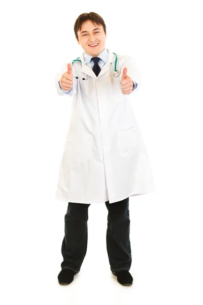 Piacevole medico mostrando pollici in alto gesto — Foto Stock
