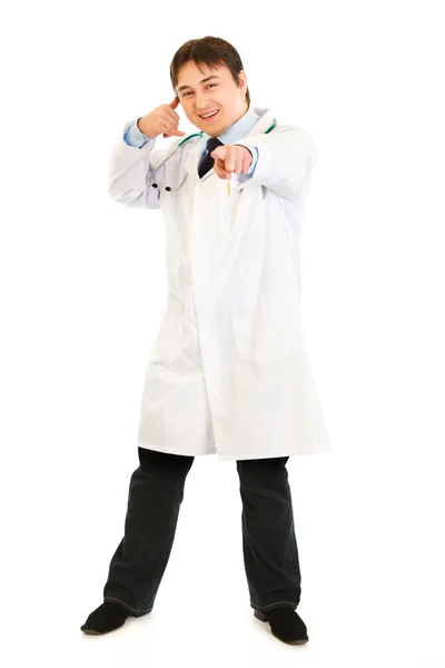 stock image Smiling medical doctor showing contact me gesture