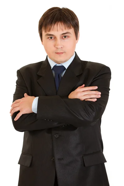 Serious young businessman with crossed arms on chest — Stock Photo, Image