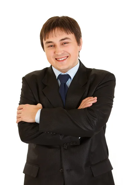 Joven hombre de negocios sonriente con brazos cruzados en el pecho —  Fotos de Stock