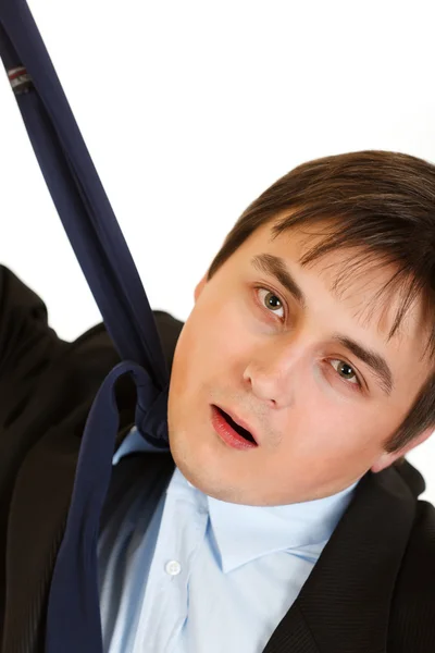 Stressed businessman hanging himself on his necktie — Stock Photo, Image