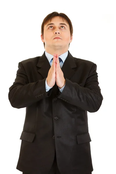 Młody biznesmen, modląc się do sukcesu — Zdjęcie stockowe