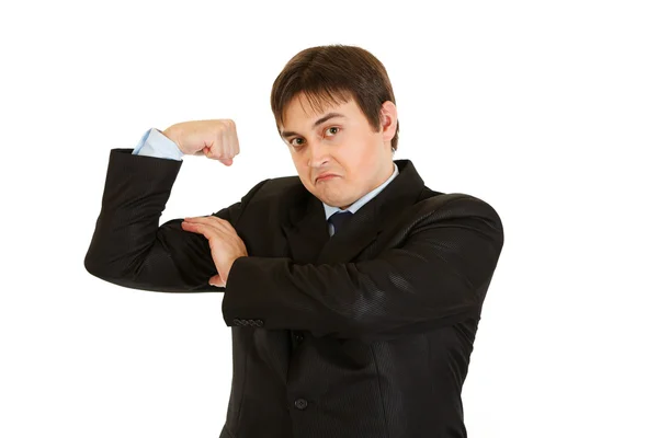 Vertrouwen jonge zakenman tonen zijn spieren — Stockfoto