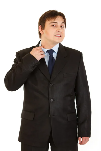 Uomo d'affari stressante tirando il colletto della camicia — Foto Stock