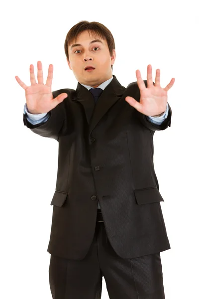 Portrait of scared young businessman — Stock Photo, Image