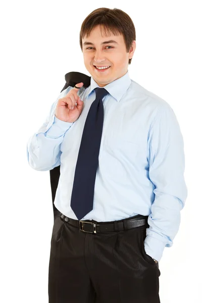 Lachende jonge zakenman met jasje op zijn schouder — Stockfoto