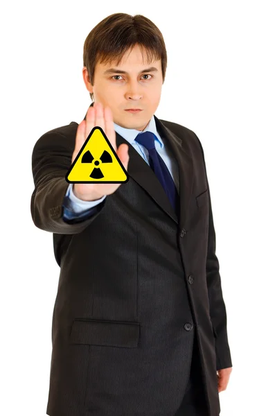 ¡Peligro a la radiación del cept! Confiado hombre de negocios moderno mostrando gesto de stop —  Fotos de Stock