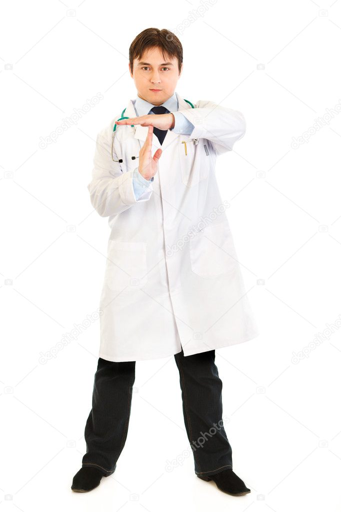 Authoritative medical doctor with time out crossed arms