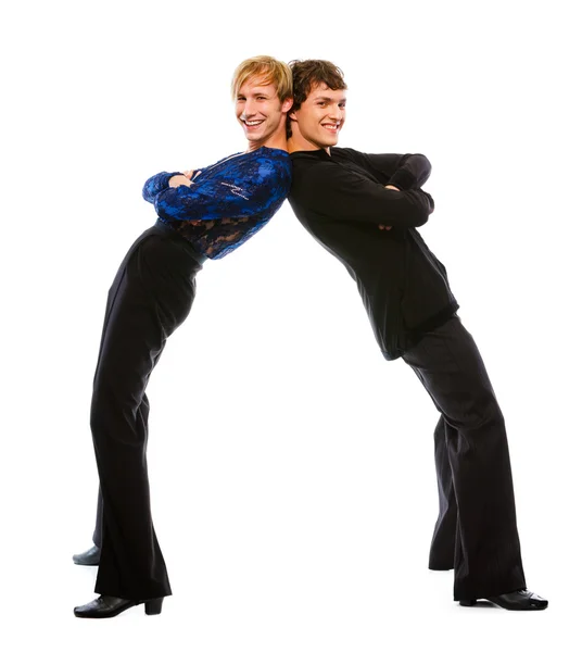 Due ballerini latini maschili in posa divertente su sfondo bianco — Foto Stock